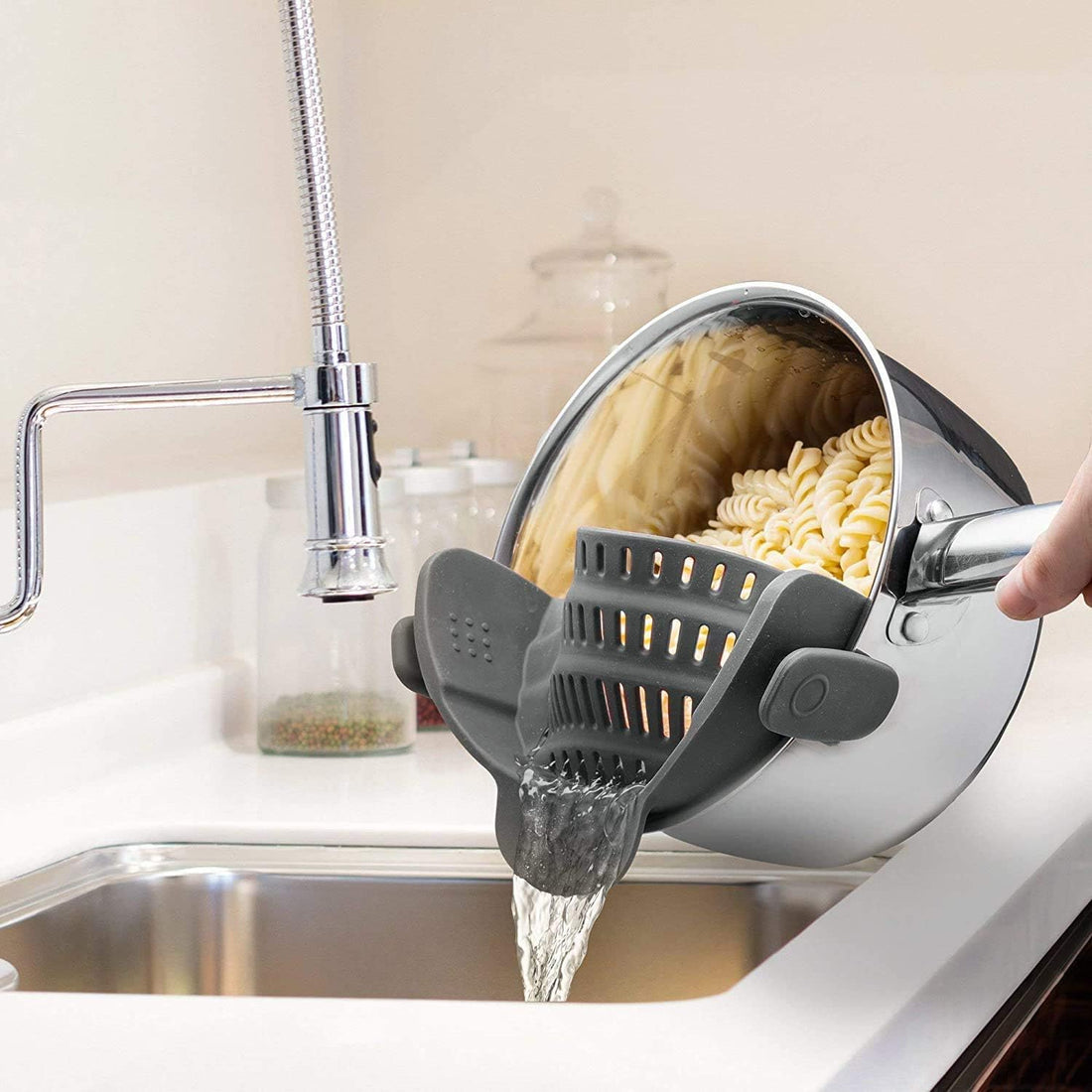 Snap N' Strain - Silicone Pasta Strainer Clip-On for Pots and Pans - Heat Resistant Colander for Vegetables and Noodles - Kitchen Gadgets for Cooking - Space-Saving Design - Gray
