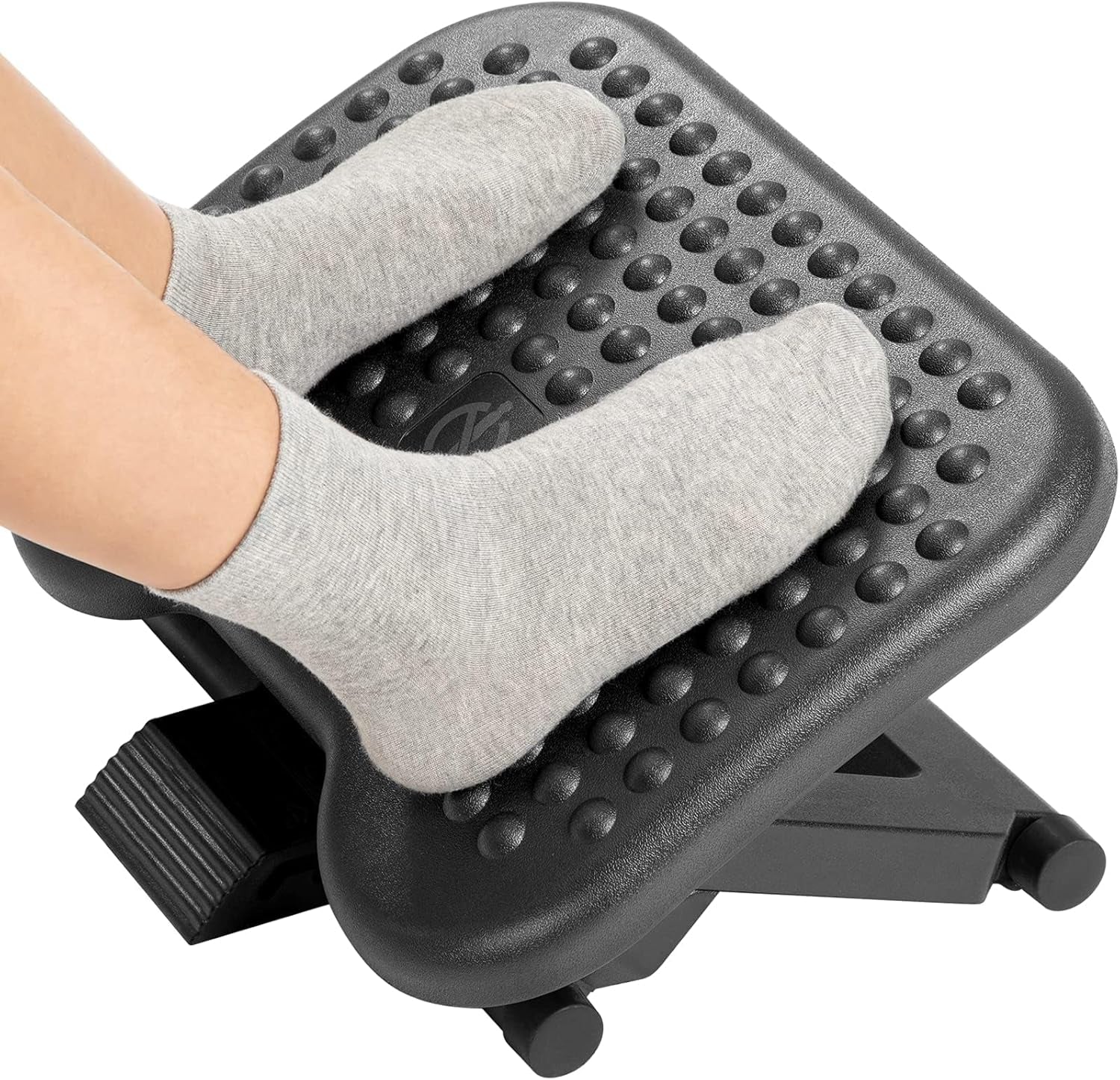 Improve comfort with an Adjustable Under Desk Footrest that offers flexible height support & ease leg strain with a tilting design.