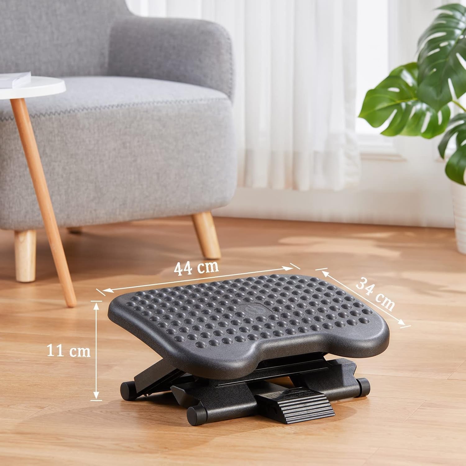 Improve comfort with an Adjustable Under Desk Footrest that offers flexible height support & ease leg strain with a tilting design.