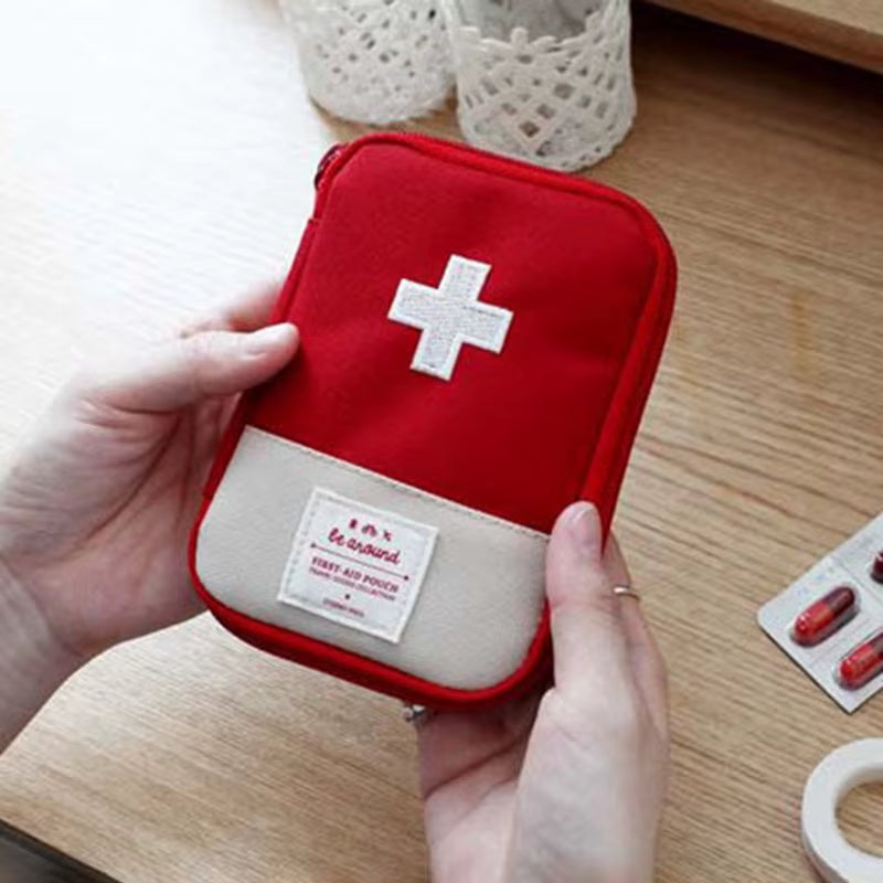 Compact Portable First Aid Kit for Travel and Outdoor Emergencies